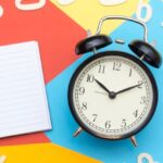 Deadlines - Alarm Clock Lying on Multicolored Surface