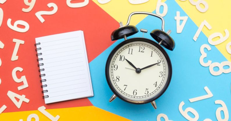 Deadlines - Alarm Clock Lying on Multicolored Surface